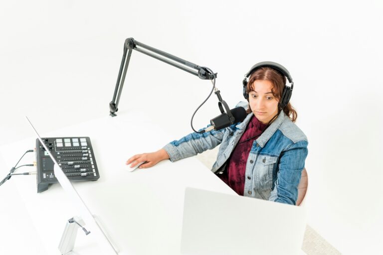 Stressed out podcaster in front of microphone